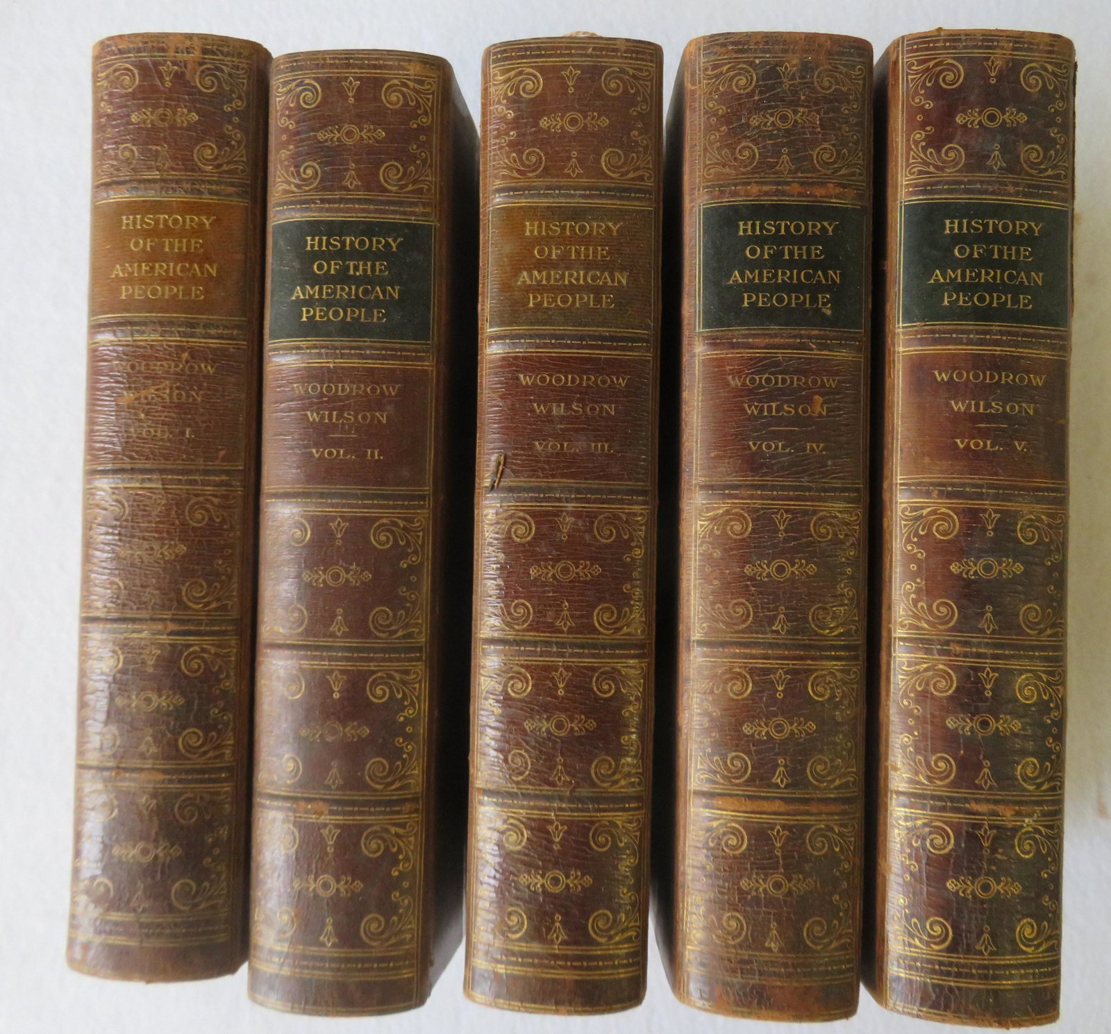 Books entitled "A History of the American People" by: Books entitled "A History of the American People" by Woodrow Wilson (as president of Princeton University), in 5 volumes, leather bound and published in NY & London by Harper & Brothers 1903. Slight u