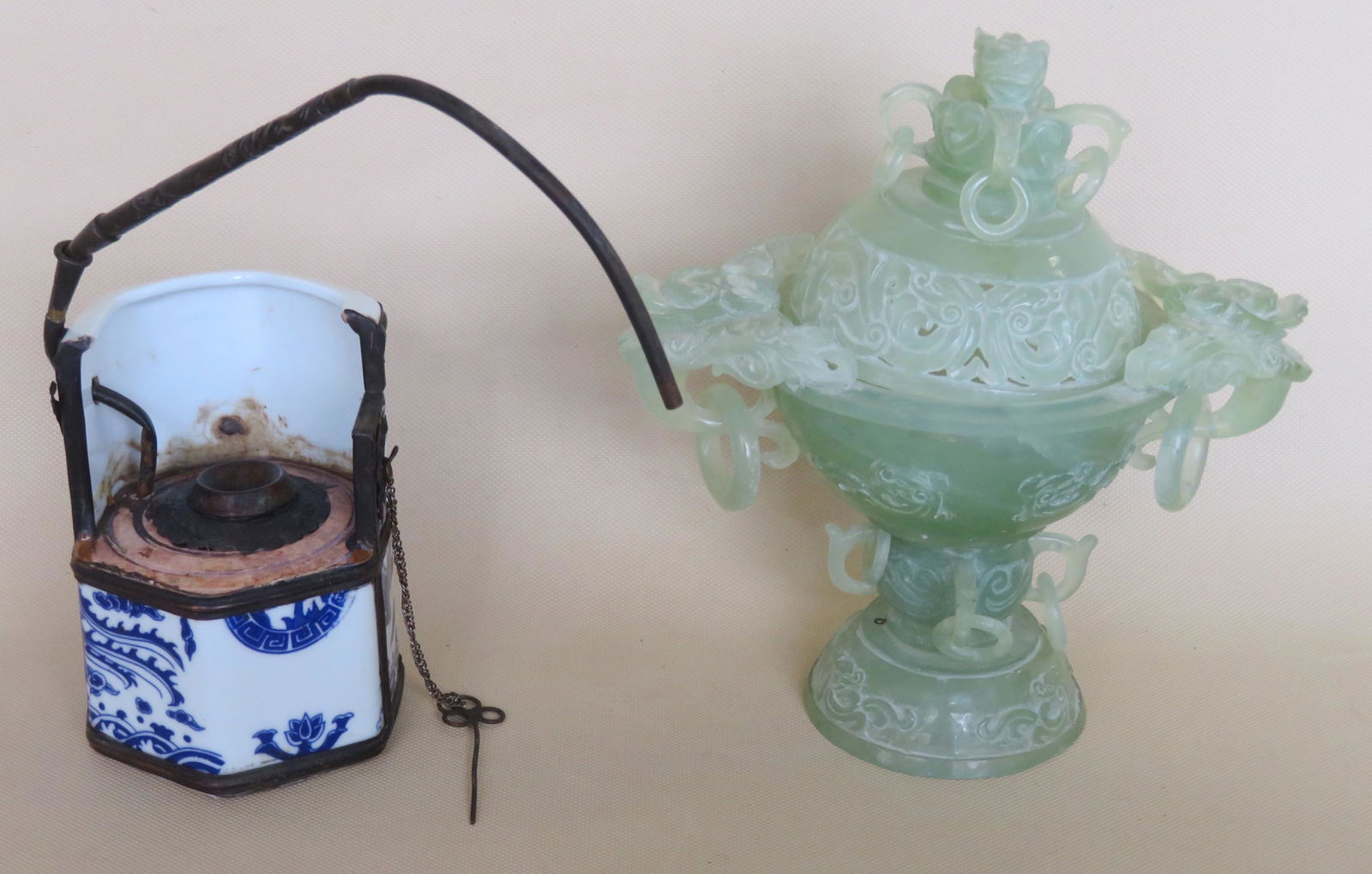 Two Chinese decorative objects including: 1) A blue and: Two Chinese decorative objects including: 1) A blue and white decorated porcelain water/tobacco pipe, hexagonal shape - the receptacle decorated with a dragon, an exotic bird and sea urchins - the orn