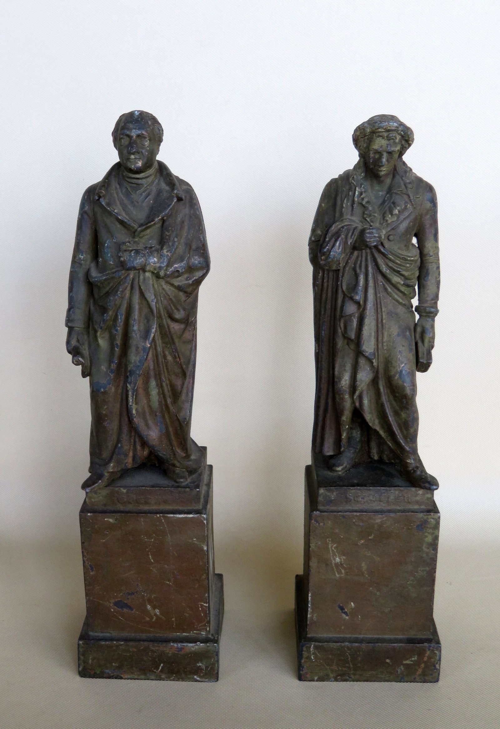 Two zinc sculptures of German literary personalities: Two zinc sculptures of German literary personalities Schiller (Freidrich Schiller 1759-1805) and Goethe (Johann Wolfgang Von Goethe 1749-1832). Both in original bronze colored paint with names marked 