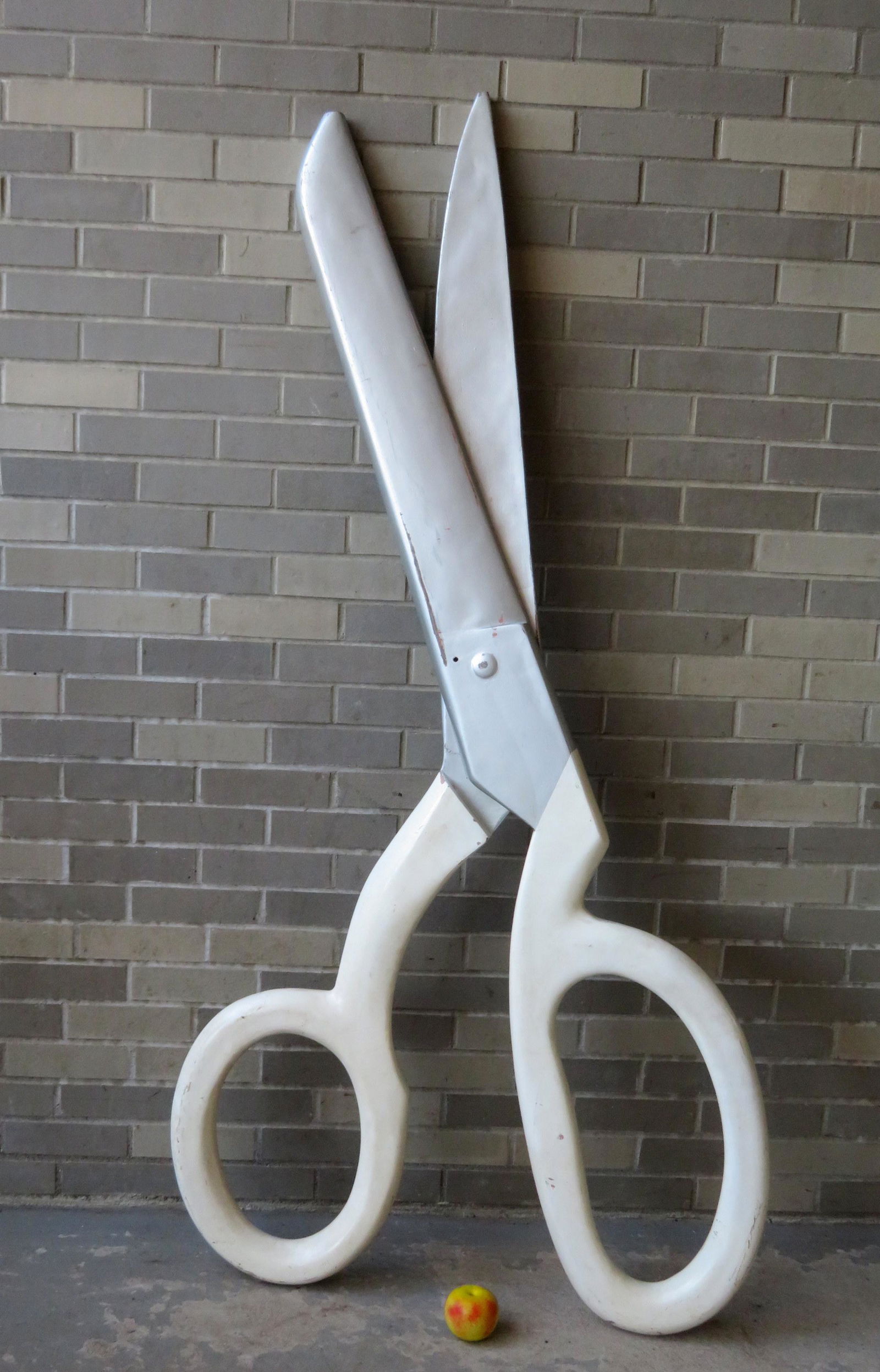 Large trade store sign in the form of a pair of: Large trade store sign in the form of a pair of scissors, probably molded fiberglass, mid 20th century. The scissors can open and close to display in various positions. Very good condition. 71 1/2"H x
