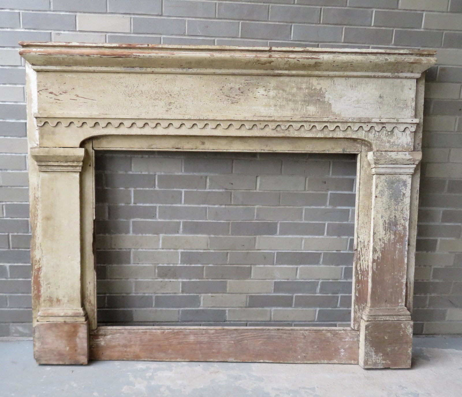 Wooden fireplace mantle, early 19th century, in old: Wooden fireplace mantle, early 19th century, in old white paint. Some losses to paint, surface abrasions, but structurally sound and in good overall condition. Overall size 62"W x 50"H - opening - 41 