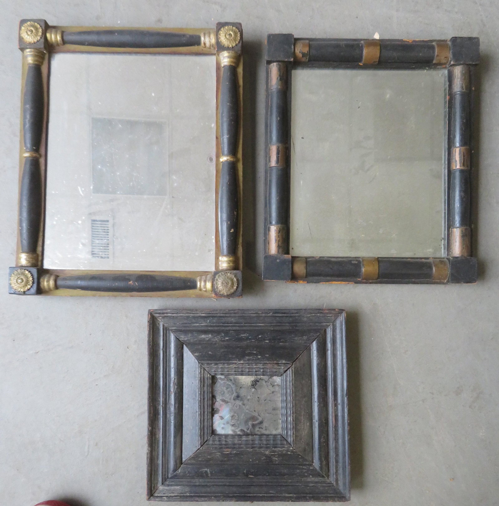 Three small size early wall mirrors including: 1): Three small size early wall mirrors including: 1) Sheraton with gesso rosettes in each corner connected by half columns on all 4 sides, in original black and gold paint, early 19th century - 13 5/8" x
