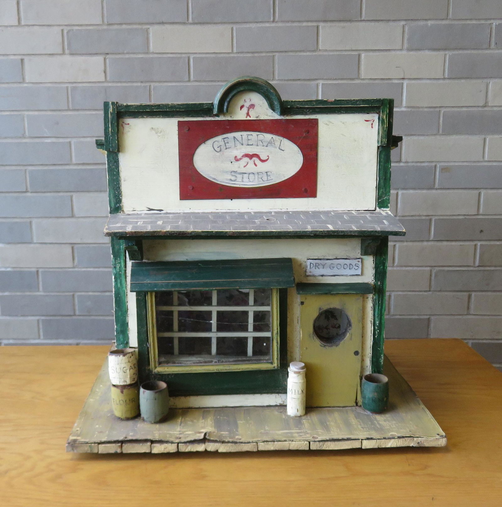 Custom made martin bird house in the form of a "GENERAL: Custom made martin bird house in the form of a "GENERAL STORE" with accessories, in original paint - late 20th century - 21 1/2"W x 18"L x 21 1/2"H. Good condition.