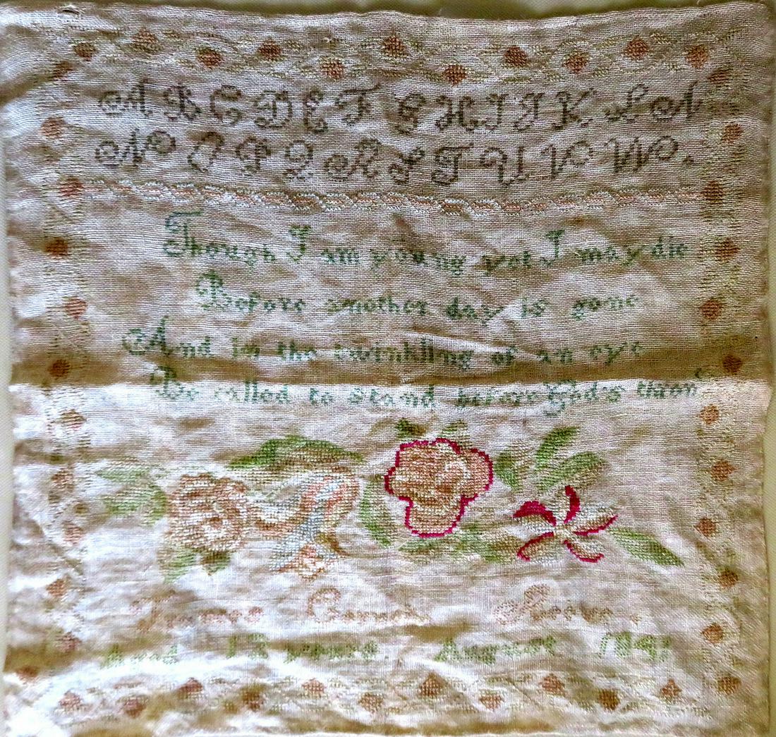 American sampler dated 1841 with verse & alphabet with: American sampler dated 1841 with verse & alphabet with lower needlework of flowers and leaves, all surrounded by a border of strawberries on vine. The verse reads "Though I am young yet I may die / Be