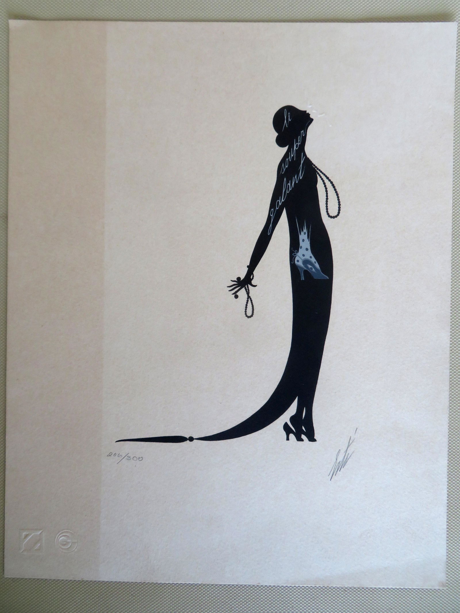 Original Erte lithograph (Romain de Tirtoff, Russian,: Original Erte lithograph (Romain de Tirtoff, Russian, 1892-1990). Pencil signed by artist and titled "The Kiss", in limited edition 206/300, published in Paris December 1975. Print Documentation inclu
