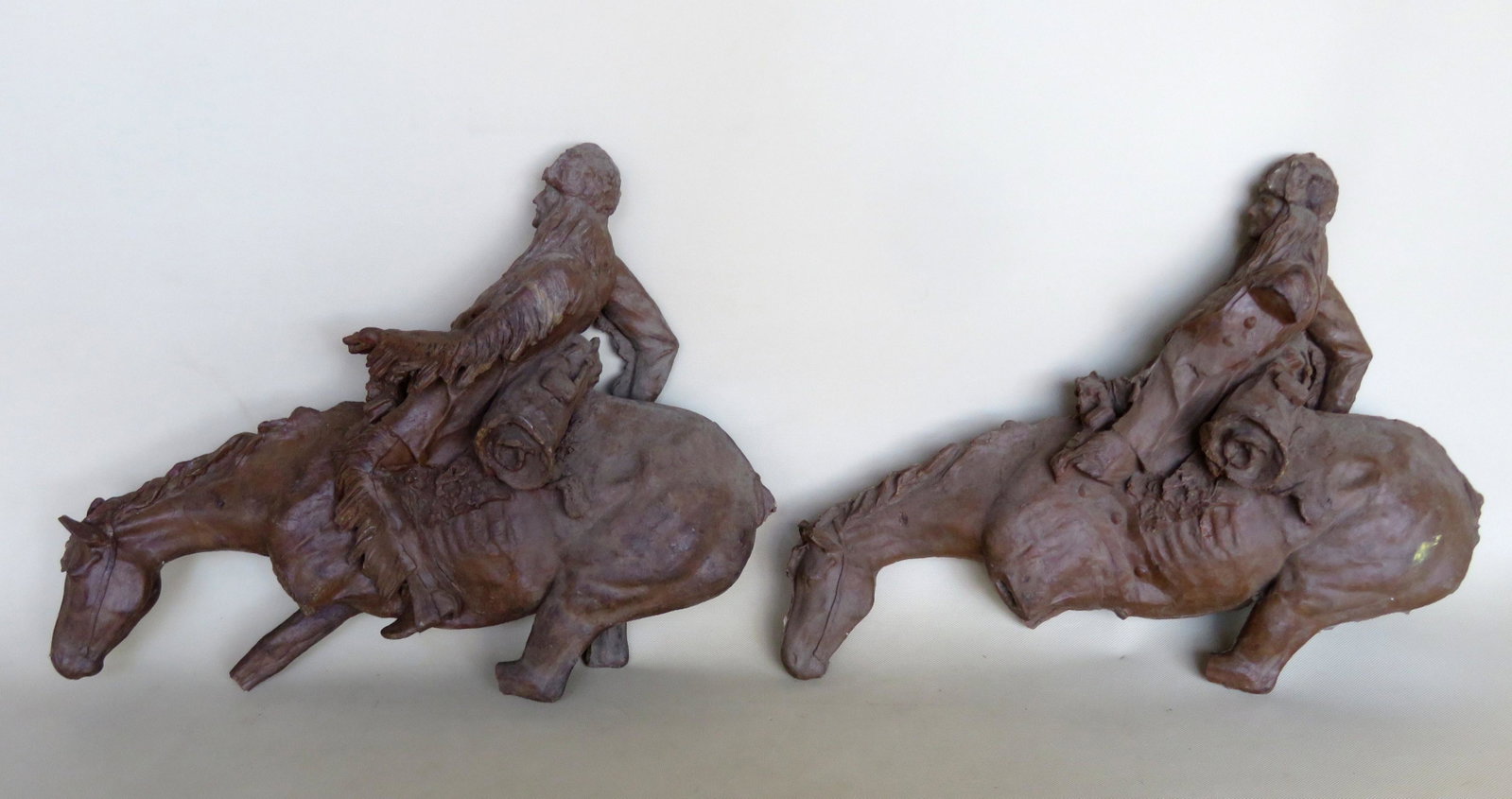 Two lost-wax sculptures of Frederick Remington's "The: Two lost-wax sculptures of Frederick Remington's "The Mountain Man", originally formed in the Roman Bronze Works foundry in Corona Queens NY, probably early 20th century. The pieces were obtained by t
