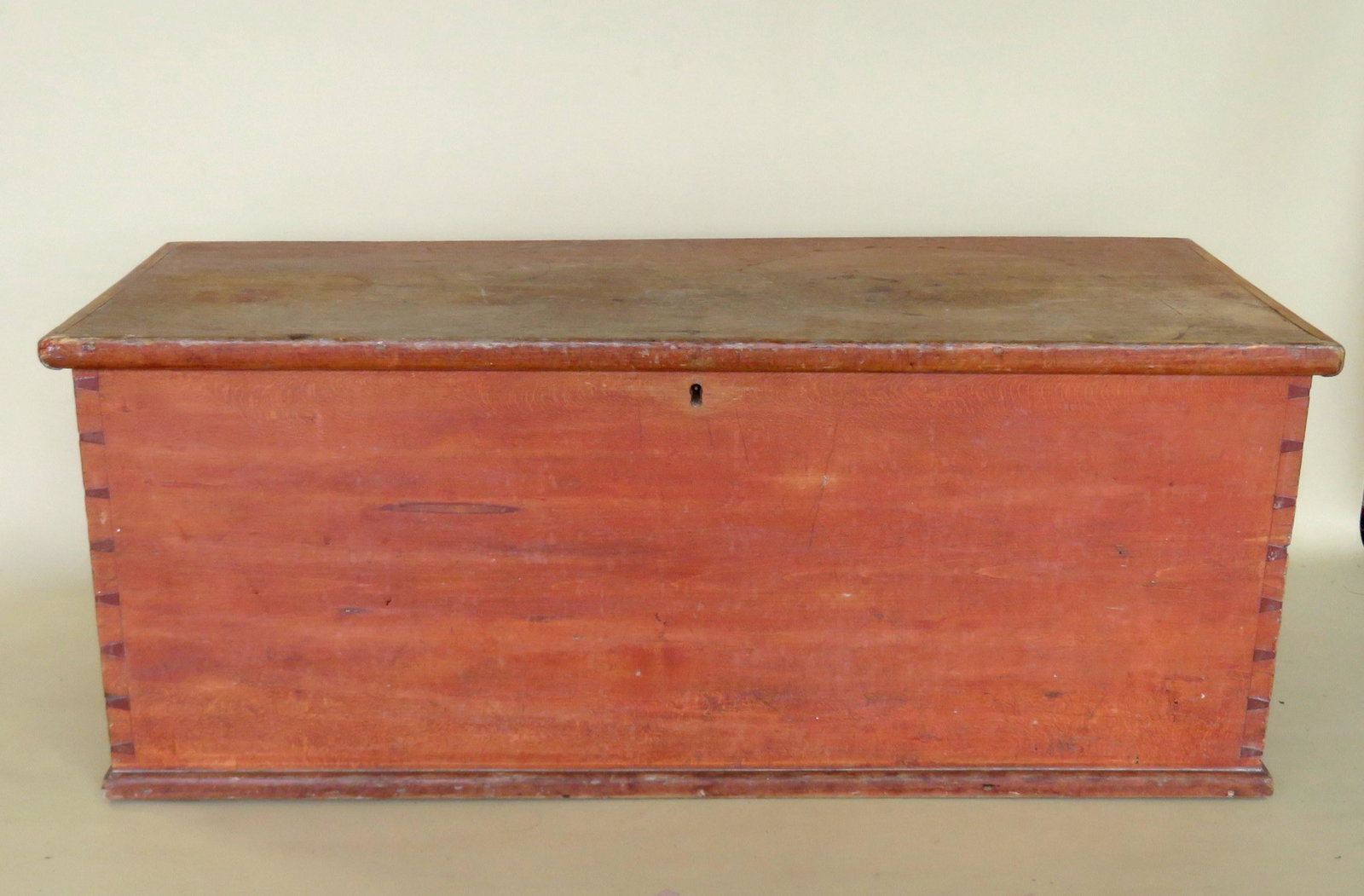 Small blanket box with butt hinges, lock and key, and: Small blanket box with butt hinges, lock and key, and interior till, mid 19th century. Traces of original red stain and in good condition. 33"W x 14"D x 13"H.