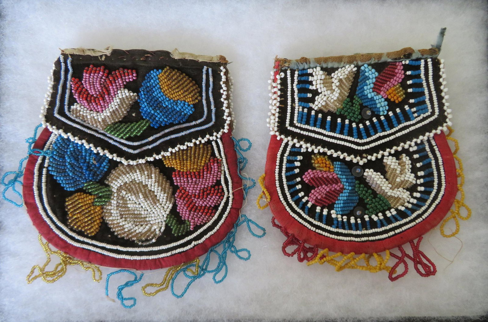 Two Native American beaded purses, both with minor: Two Native American beaded purses, both with minor beadwork losses on perimeter. Each approximately 5" x 5" and in good condition. Late 19th to early 20th century.