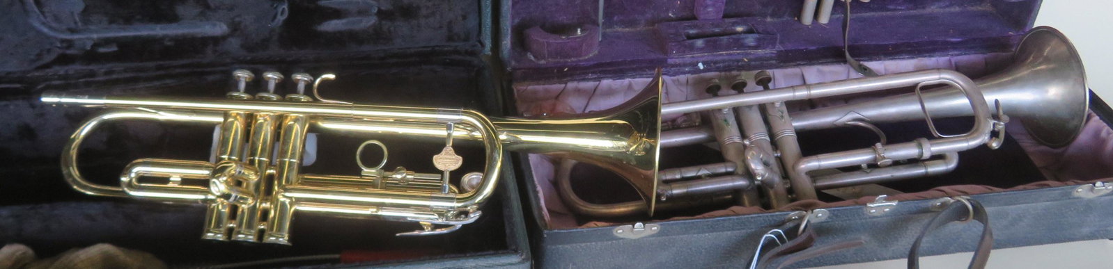 Two trumpets including: A King silver trumpet in: Two trumpets including: A King silver trumpet in original box signed "King Master Model / Made by H.N. White Co. / Cleveland Ohio", and also marked "Medium Bore" - Serial number 40175 - a tiny ding on