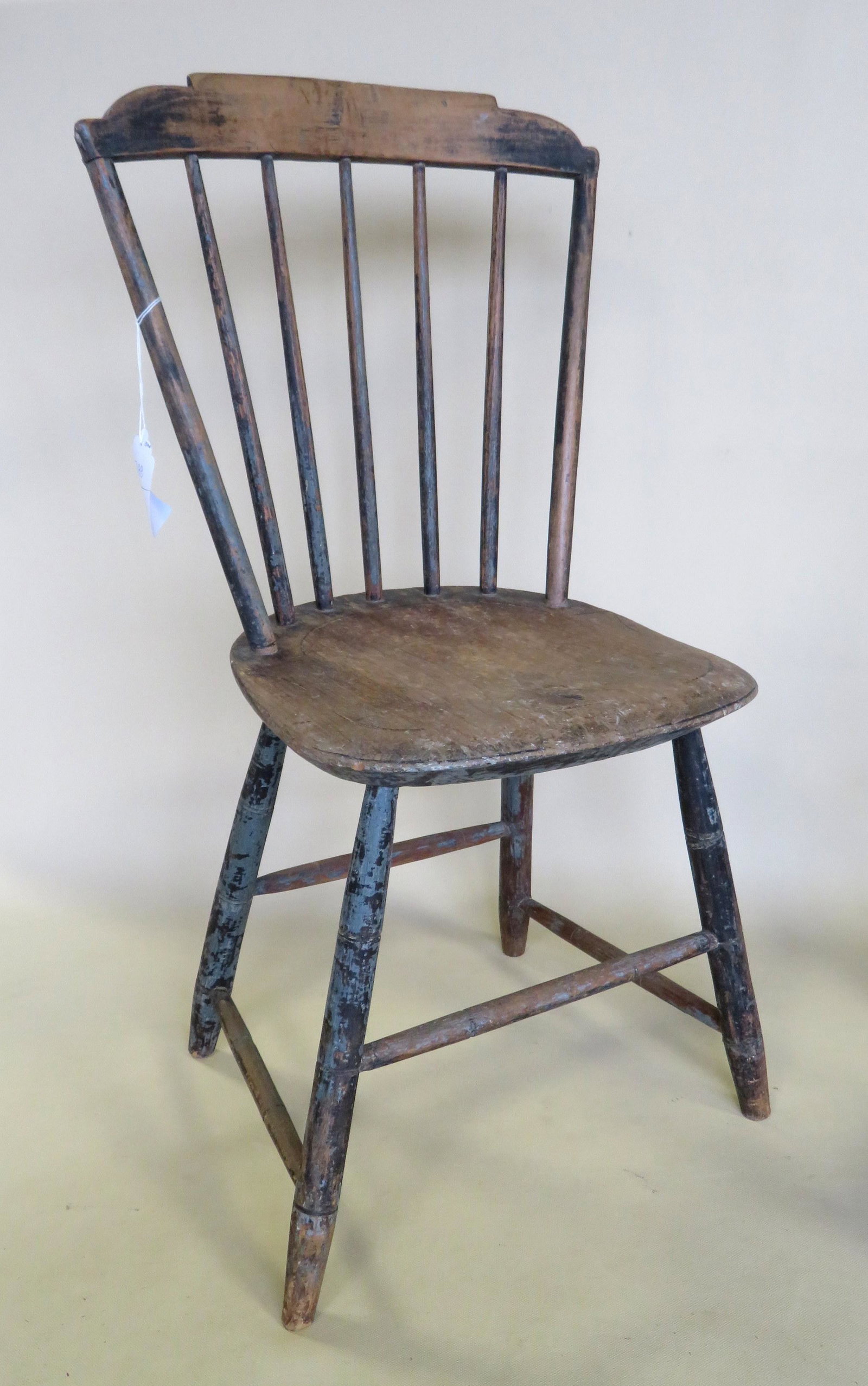 Step-down Windsor child's chair with saddle seat,: Step-down Windsor child's chair with saddle seat, traces of original blue paint, 18th century. 30"H x 16"W x 14 1/2"H (top of seat). Good structural condition.