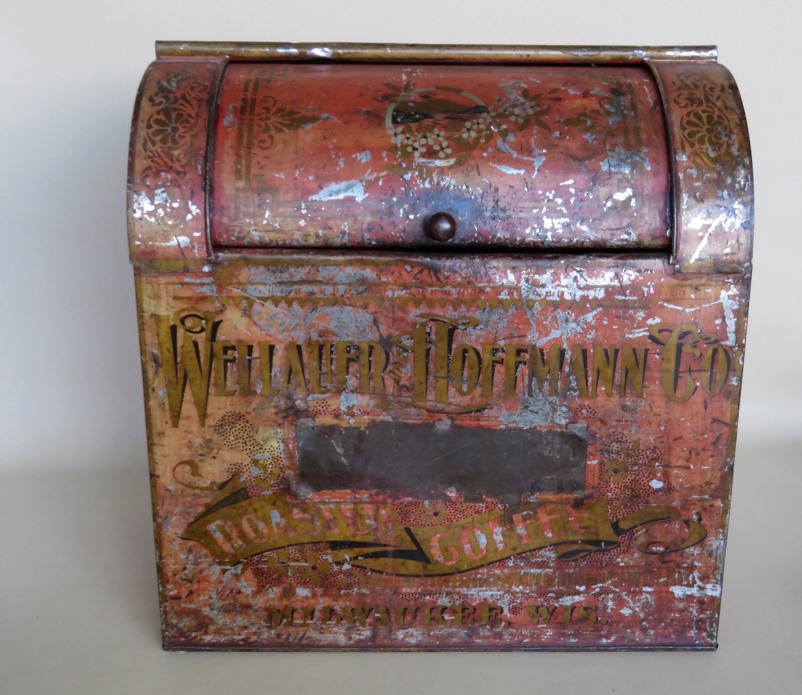 Large stenciled country store coffee bin stenciled: Large paint decorated country store coffee bin stenciled "Wellauer Hoffmann Co. / Roasted Coffee Milwaukee Wisc." - The paint is worn and scratched, minor dings, overall fair condition. 19"W x 19 1/2"
