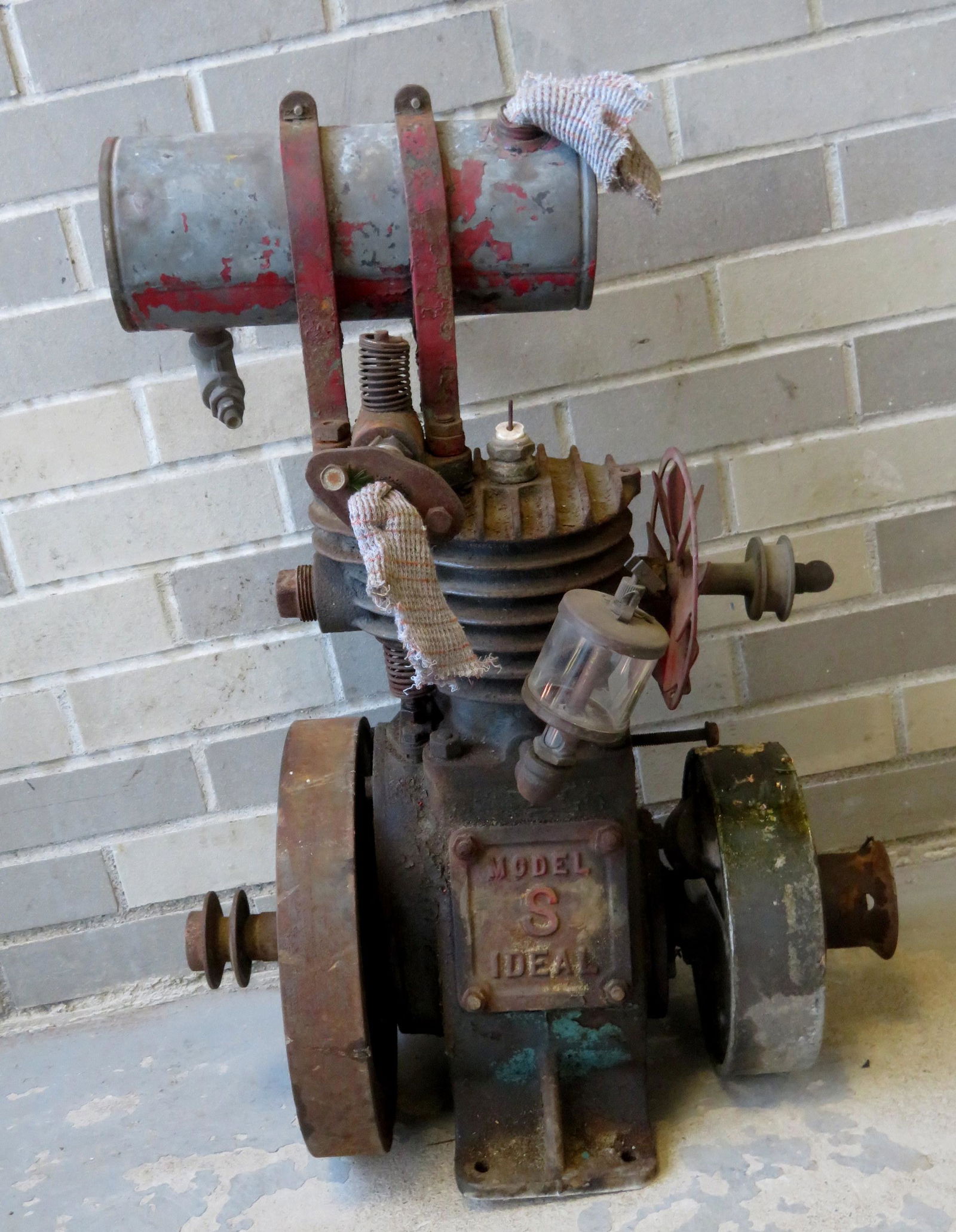 Ideal Model "S" engine. Likely a lawn mower engine.: Ideal Model "S" engine. Likely a lawn mower engine. Unknown HP. 19"L x 12"W x 25"H. Note, all engines are sold as-is, non-working, possibly missing parts, some with surface rust, some with traces of o