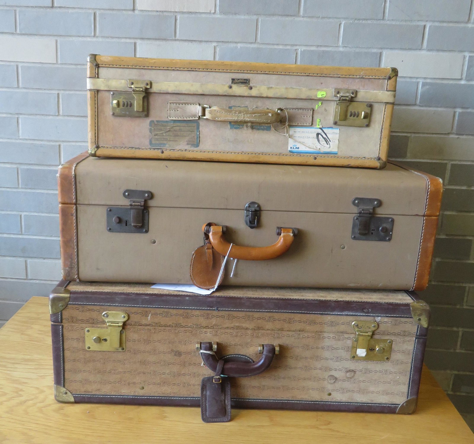 Three pieces of vintage luggage, from the Leopold: Three pieces of vintage luggage, from the Leopold Quarles Van Ufford estate, former Dutch Council General to the USA: 1) Leather signed A. Andres - 27 1/2"W x 20 1/2H x 9"D; 2) Hard leather signed "Ha