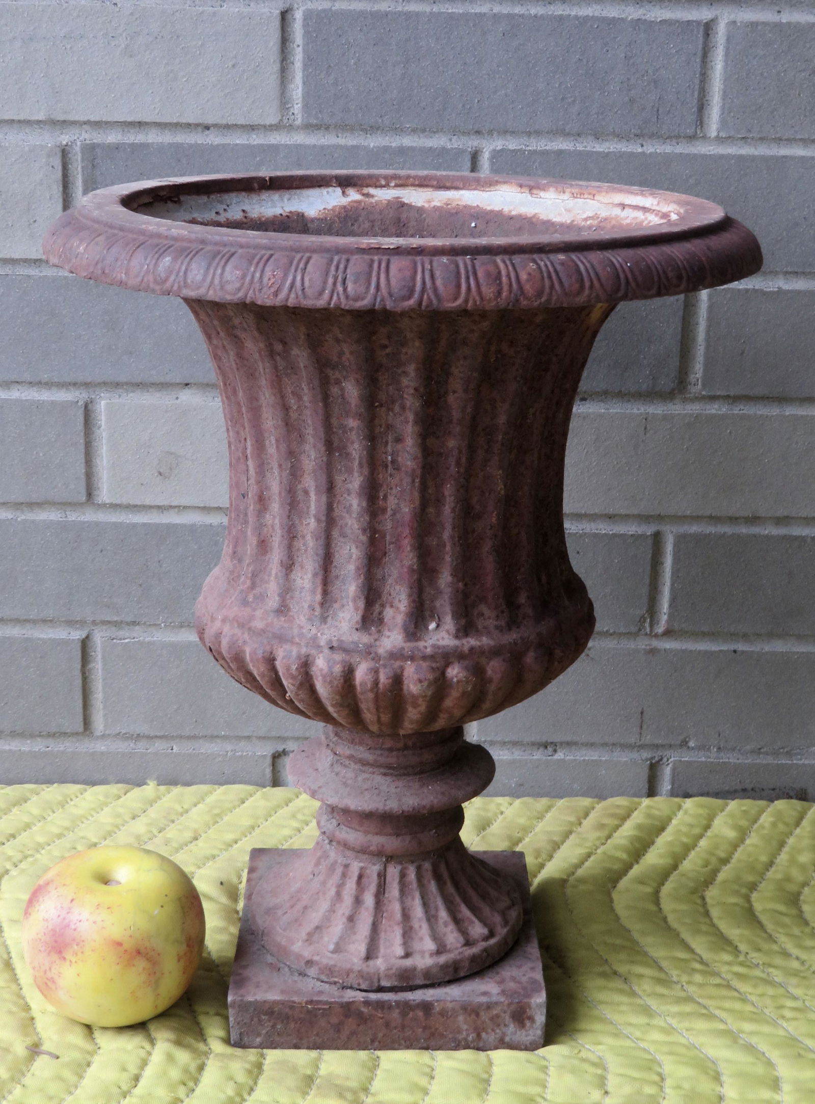 A small cast iron garden urn. (1 of 4)