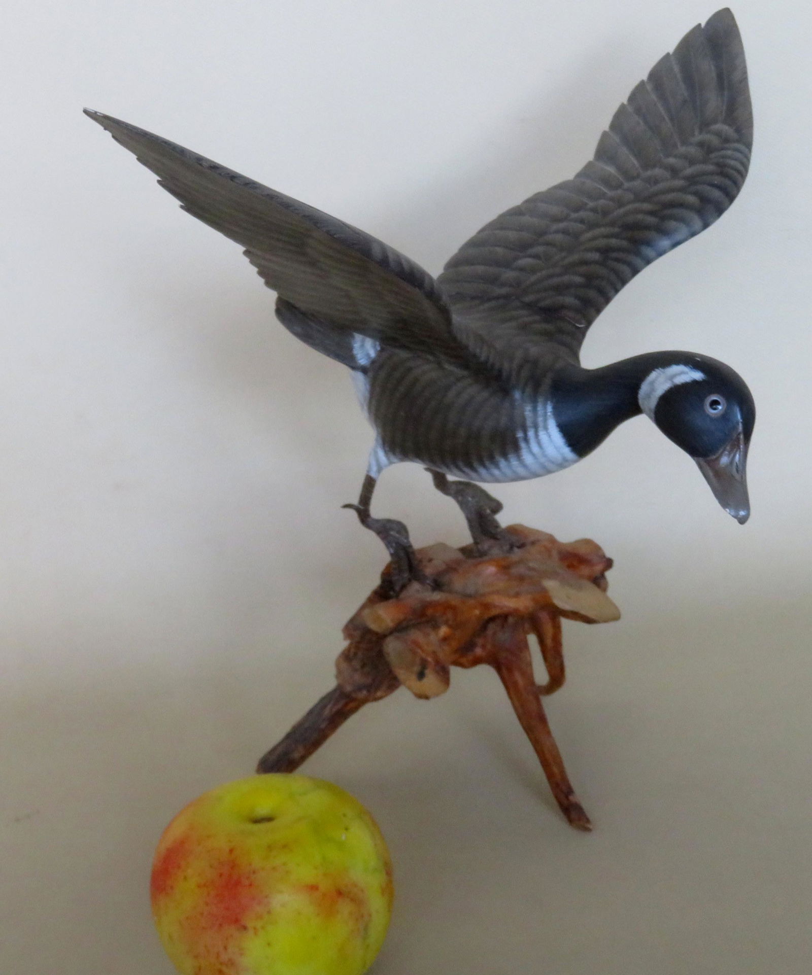 Carved wooden miniature flying goose mounted on rusted (1 of 8)