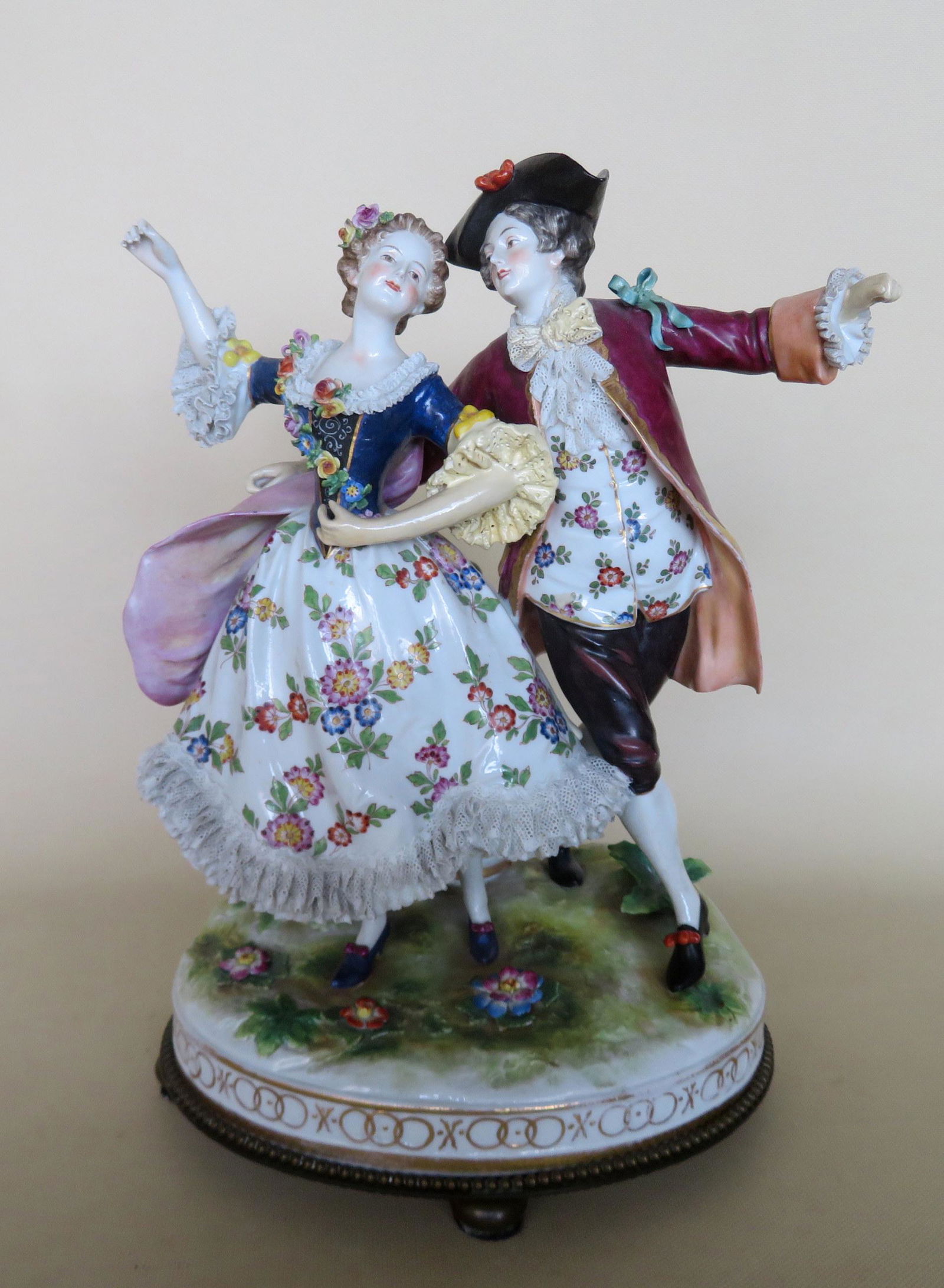 Figurine featuring colonial man and woman dancing (1 of 6)