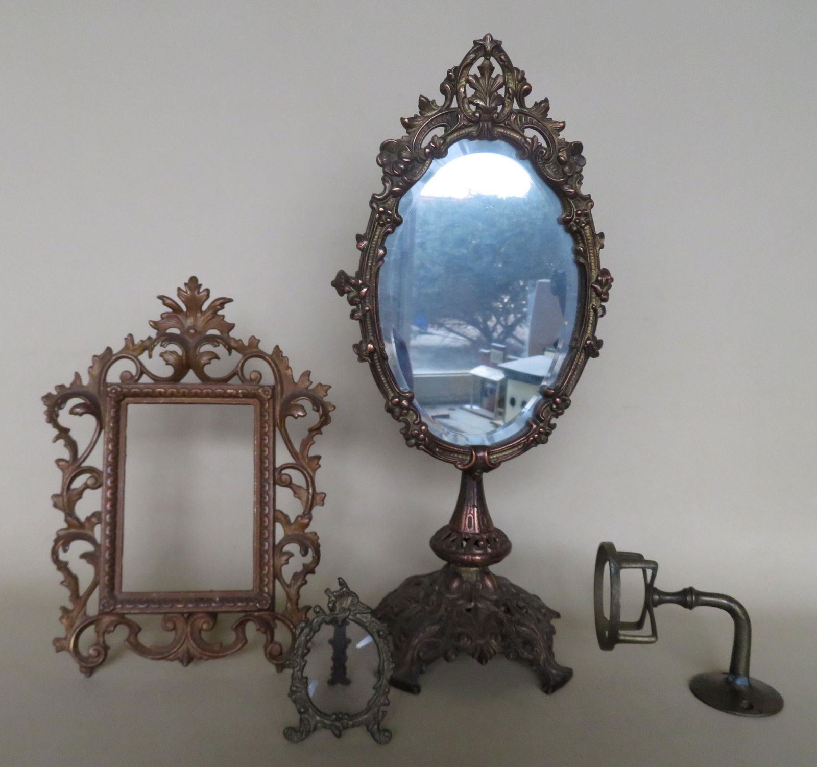 Grouping of 4 brass decorative items including a (1 of 3)