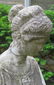 A cast stone garden sculpture/fountain, that depicts a - 5