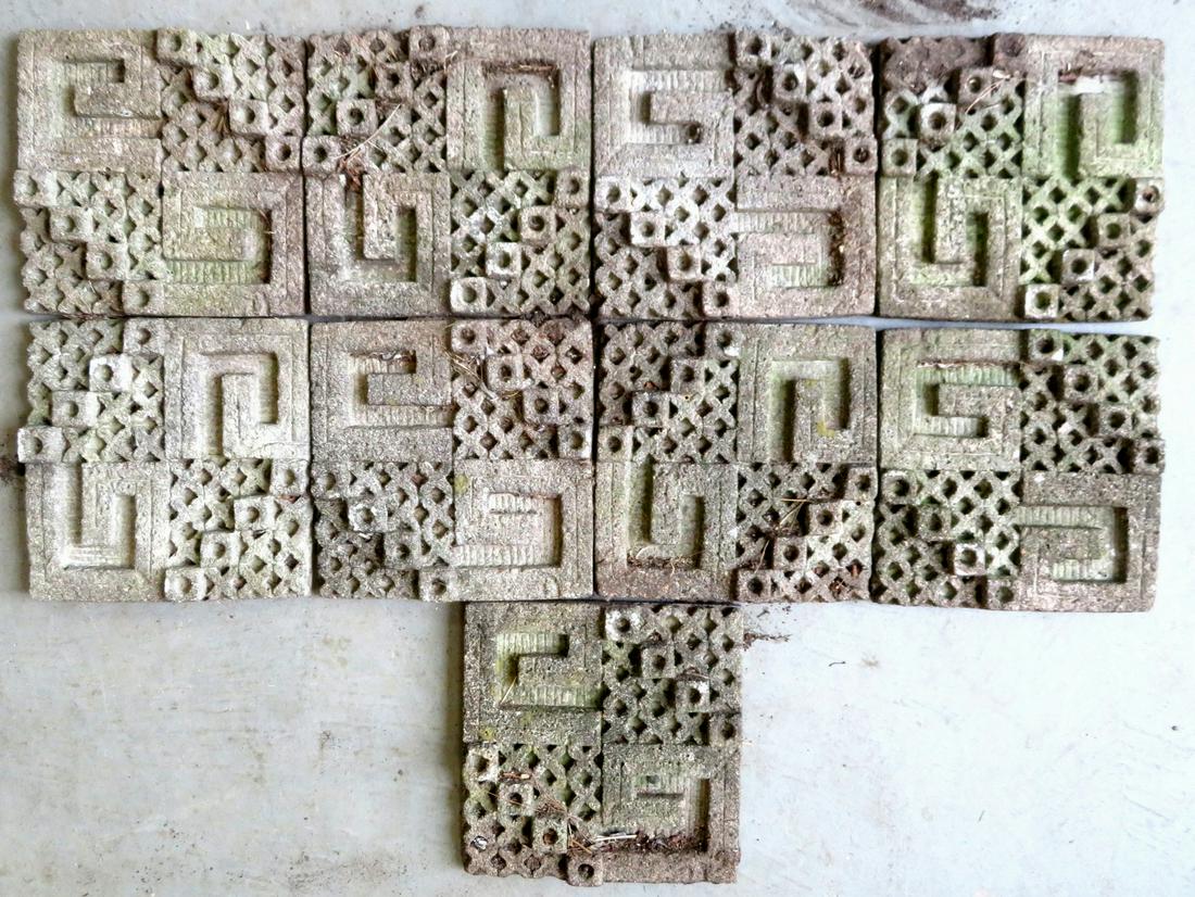 Grouping of 9 concrete Frank Lloyd Wright inspired: Grouping of 9 concrete Frank Lloyd Wright inspired concrete wall or garden tiles, mid 20th century, each 12" square. One tile with chip and loss in corner, and others with minor use wear and small bor