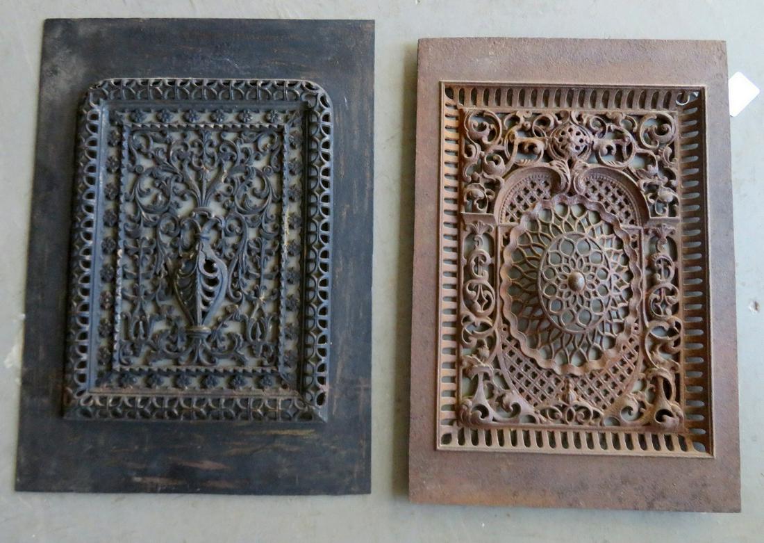 Two cast iron grates with ornate pierced decorations,: Two cast iron grates with ornate pierced decorations, late 19th century. The largest, 28"H x 20 1/2"W and is signed "DESIGN PATENTED MAY 14, 1878 / C & B. 400." - note that an old professional welded