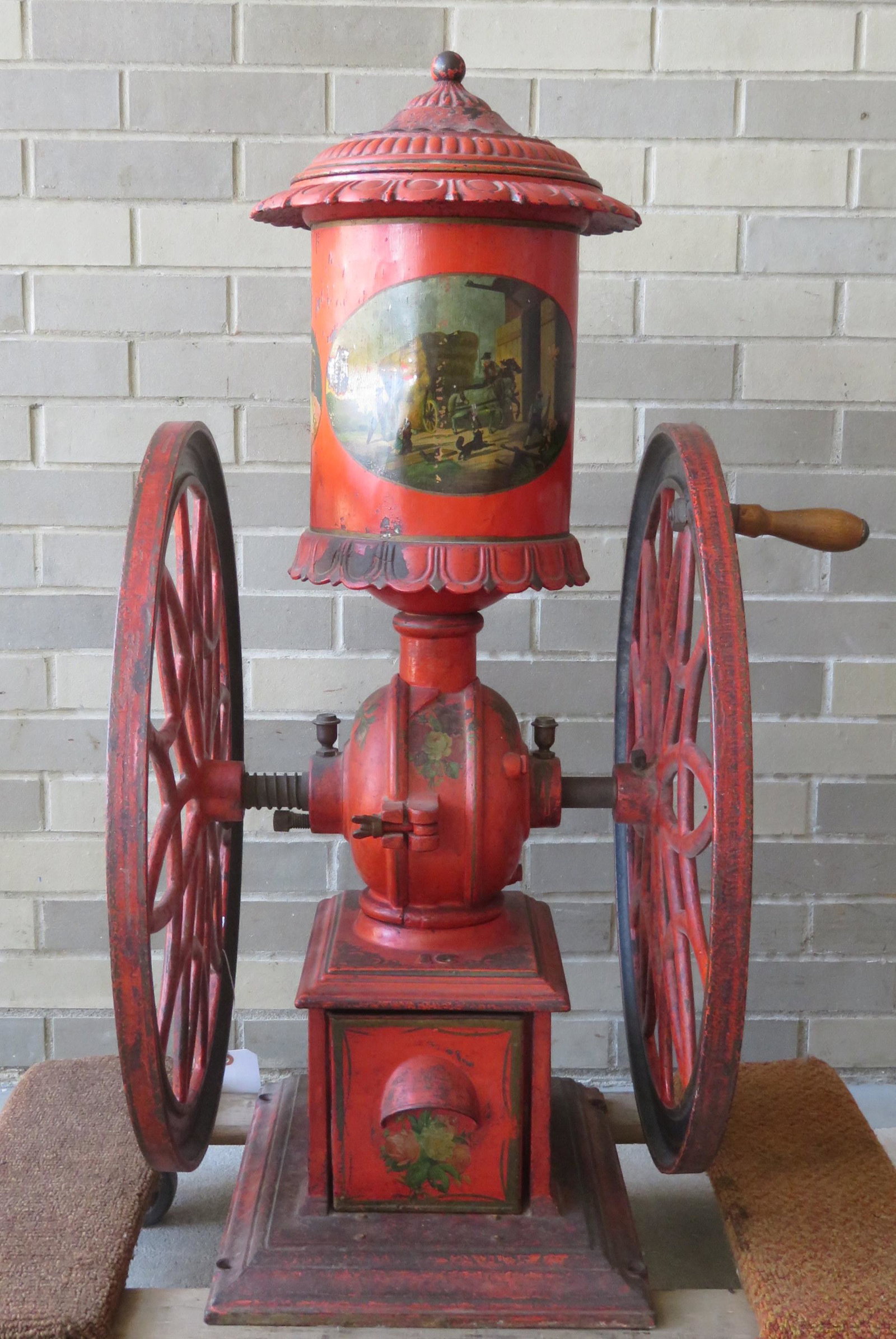 A country store coffee mill signed "Swift Mill . Lane: A country store coffee mill signed "Swift Mill . Lane Brothers . Poughkeepsie . N.Y." - No. 16 with smokestack hopper in original paint. The swivel cast iron lid with finial, over the painted tin hopp