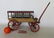 A toy or salesman sample model of a horse drawn covered