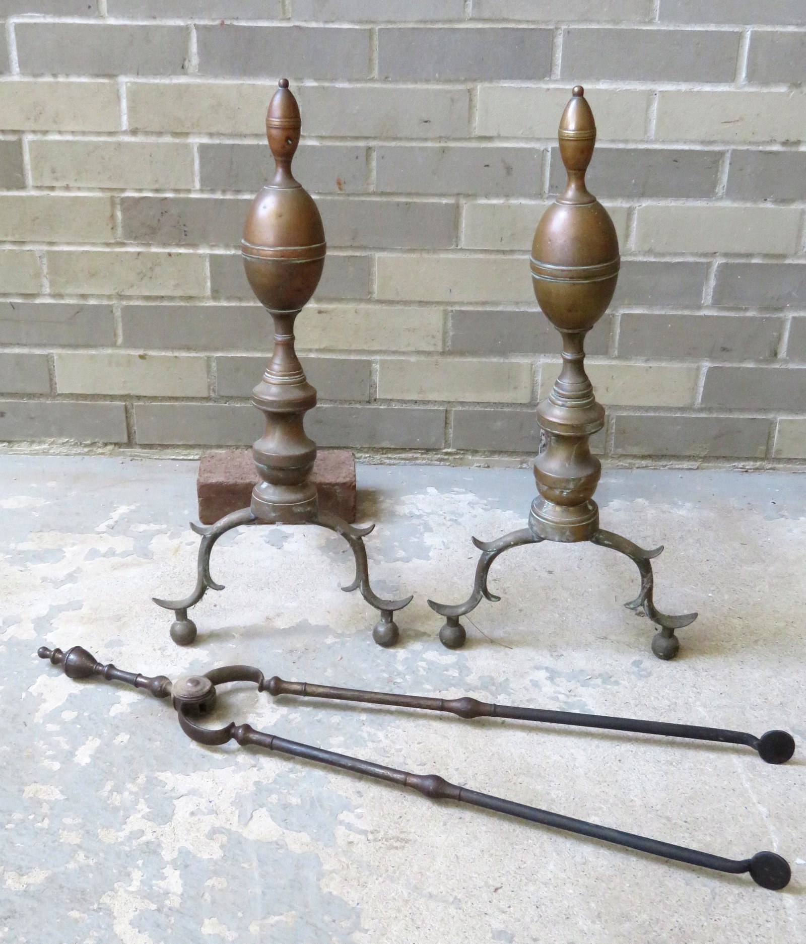 A pair of brass Chippendale double lemon top andirons -: A pair of brass Chippendale double lemon top andirons - one of the iron firedogs with loss on end (burnt off from use over the years), otherwise very good condition - 22 1/2"H; combined with a pair of