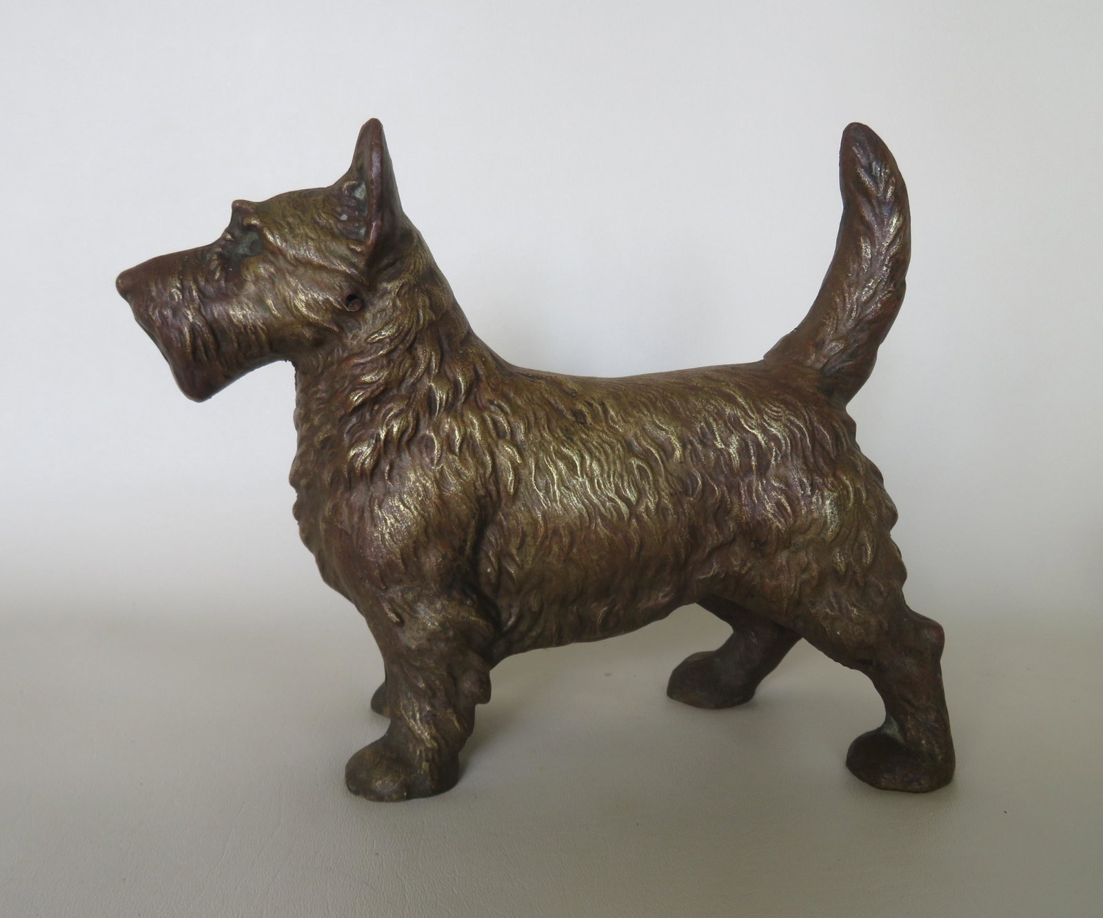 Brass Scottie Dog door stop, full body, late 19th to: Brass Scottie Dog door stop, full body, late 19th to early 20th century. Very good condition. 10 1/2"W x 8 1/2"H.
