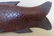 A folk art carved oak figural fish boot jack on turned - 3