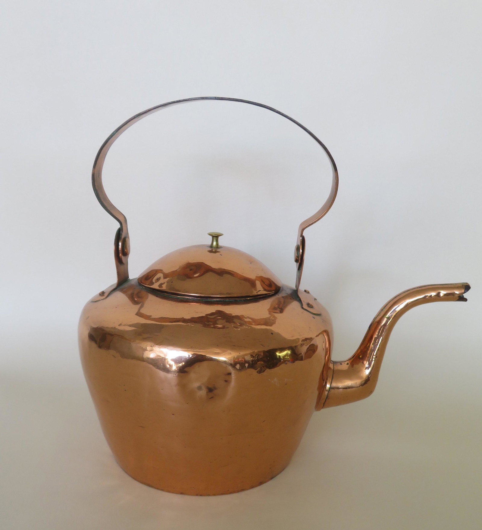 An early Pennsylvania brass goose neck tea kettle with: An early Pennsylvania brass goose neck tea kettle with impressed mark "J. Upperman" on swivel handle, dovetailed construction - John Upperman, coppersmith active in Lancaster Pennsylvania in 1811 (per