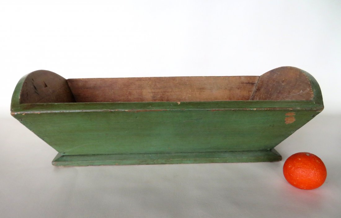 A good primitive dough box in original green paint,: A good primitive dough box in original green paint, 19th century, very good condition. Size 26 1/4"L x 12 1/4"W x 8"H.