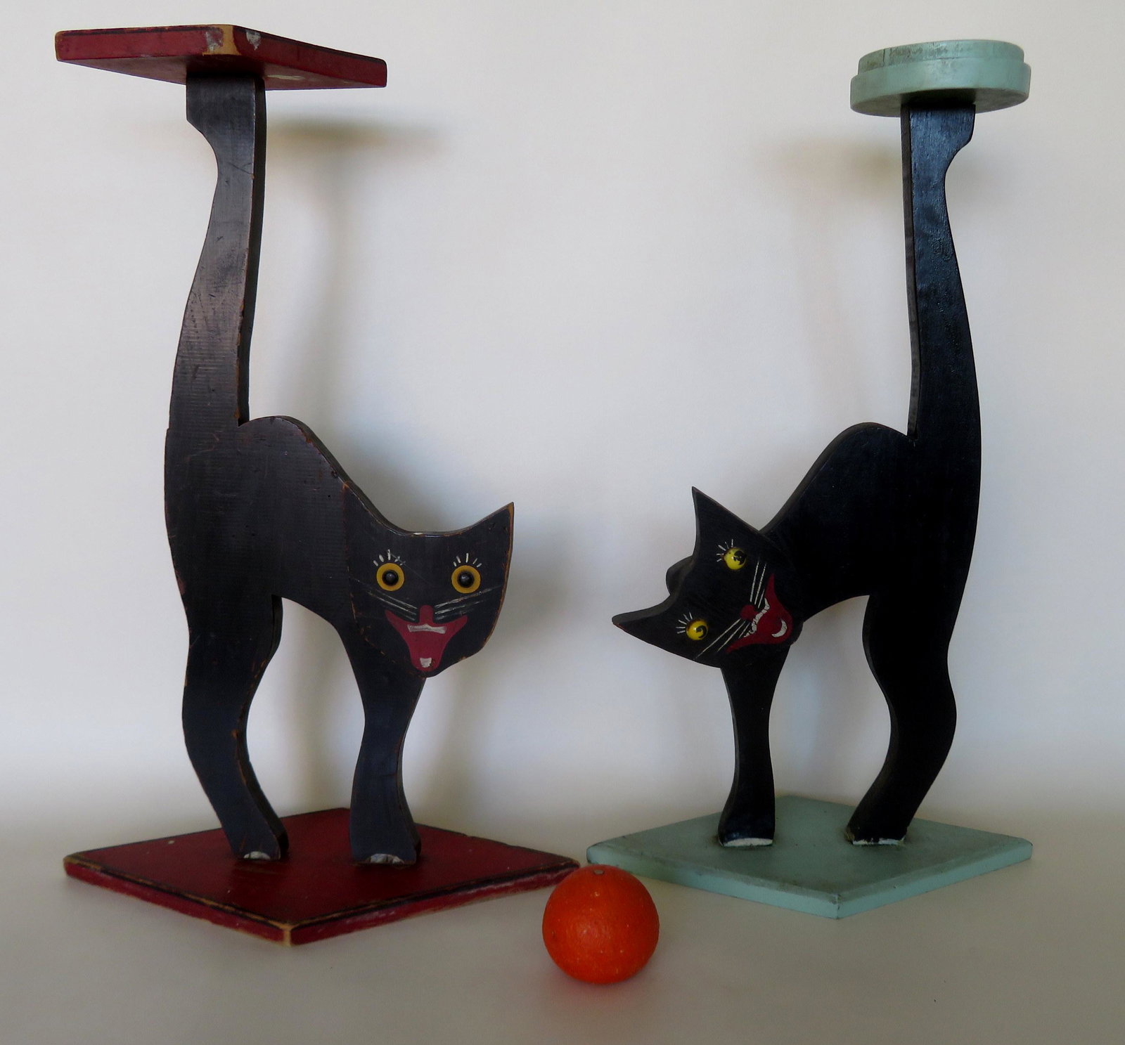 Two folkart figural Halloween black cat serving or: Two folkart figural Halloween black cat serving or smoking stands, Art Deco period. Both in original paint and one with marble glass eyes. Very good condition. The largest 24 1/2"H x 16"W x 7 1/2"D.