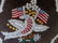 A velvet beadwork pillow, the center decorated by an - 2