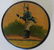 An circular paper mache snuff box with hand painting of