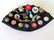 A wonderful 1930-40's child's felt beanie cap with many - 2