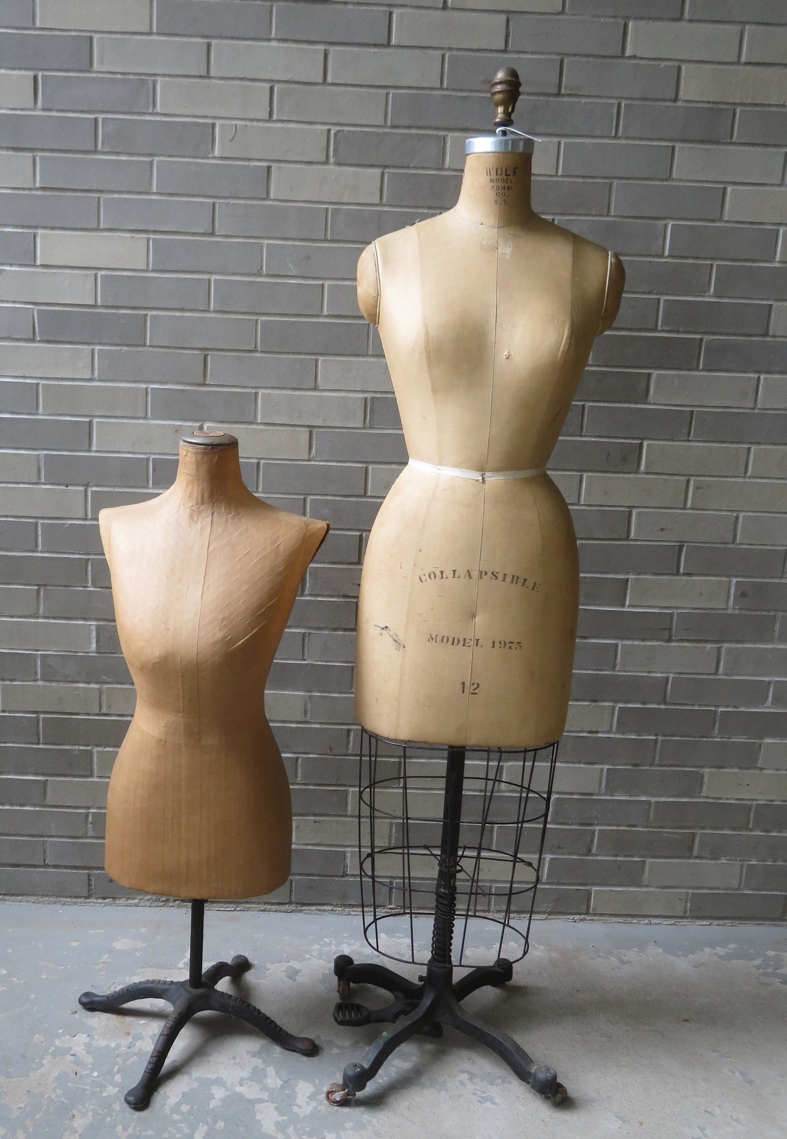 Two mannequins including: 1) Wolf Model Form Co. N.Y.,: Two mannequins including: 1) Wolf Model Form Co. N.Y., Collapsible, Model 1975 #12 - good condition - 62 1/2"H x 16"W; 2) Hall Borchert Dress Form Co. N.Y., No. 1987, paper mache, very sculptural appe
