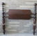 An unusual early maple and pine wooden bed with turned - 2