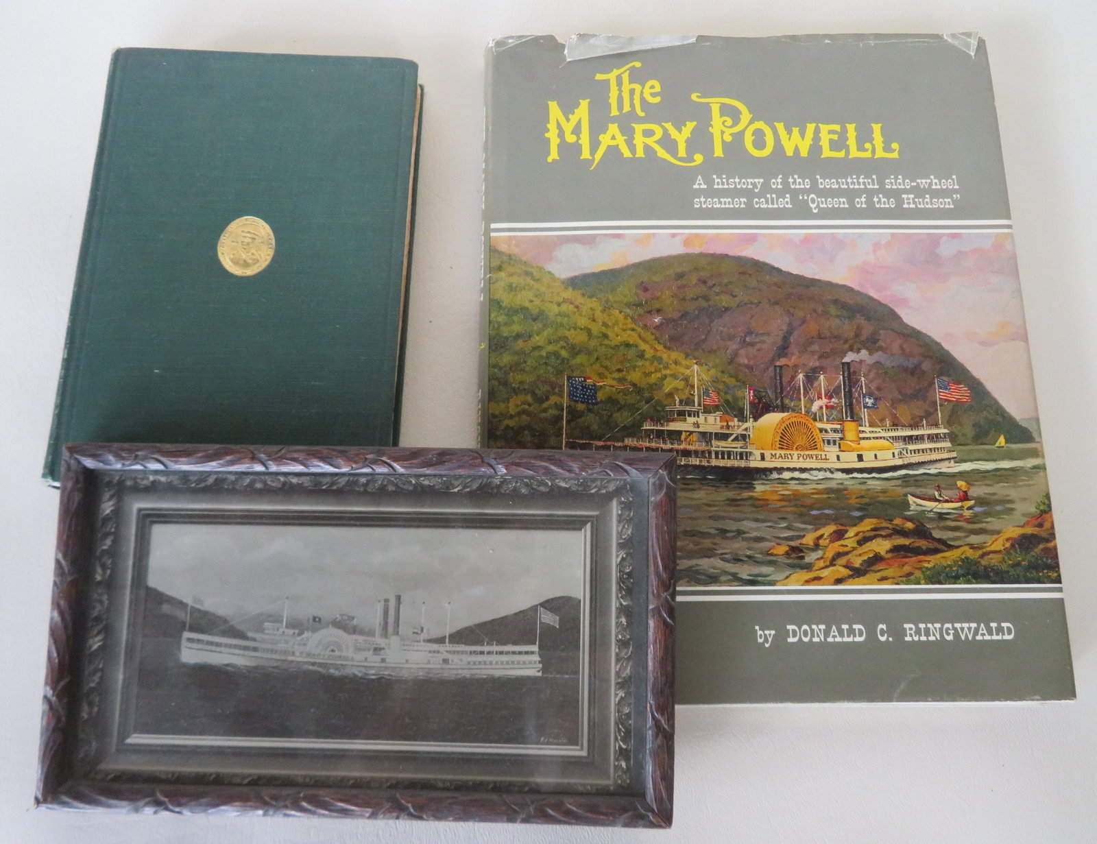 Three Mary Powell steamboat articles including: Small: Three Mary Powell steamboat articles including: Small framed photograph of the Mary Powell in original frame, early 20th century, in very good condition - overall frame size 9" x 5 1/4"; book entitled