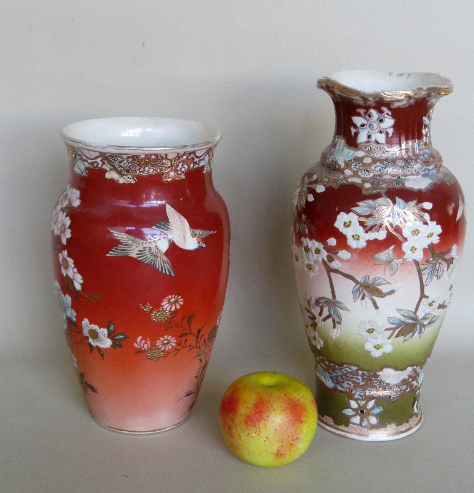 Two good hand painted Satsuma vases including: The: Two good hand painted Satsuma vases including: The first decorated with flowers and exotic flying birds, late 19th century, oriental signature on base (see photo) - 10 1/8"H; and the second, the talle