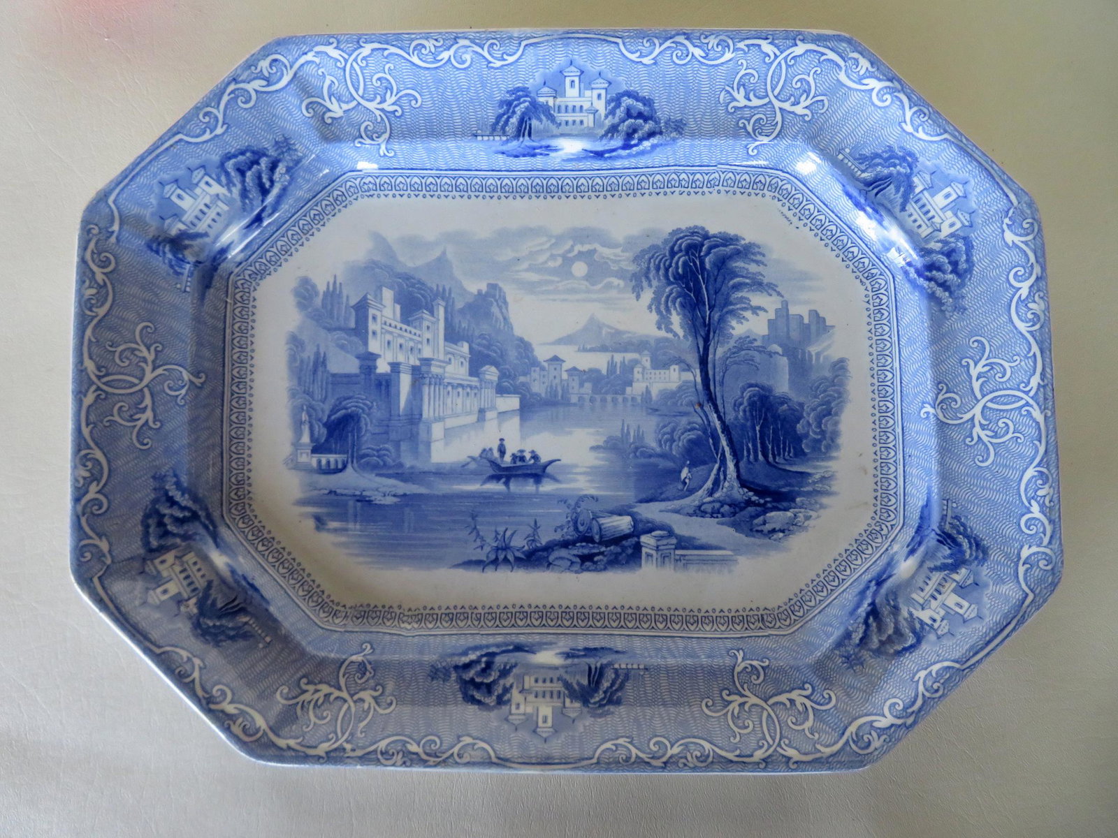 Staffordshire blue and white octagonal shaped platter: Staffordshire blue and white octagonal shaped platter, signed "Ironstone / Navarino / W. Adams", slight use wear and overall very good condition, no chips, cracks or repairs. 15 1/2" x 11 3/4".