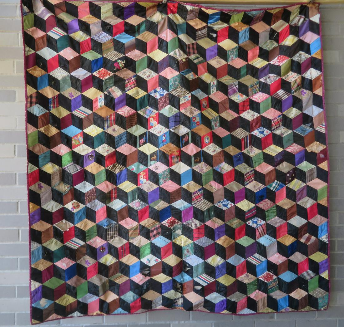 Three textiles including 2 silk crazy quilts: Three textiles including 2 silk crazy quilts in need of restoration. The first in a Rolling Block pattern having 2 American flag patches sewn into the center, plus other decorations - some detioration
