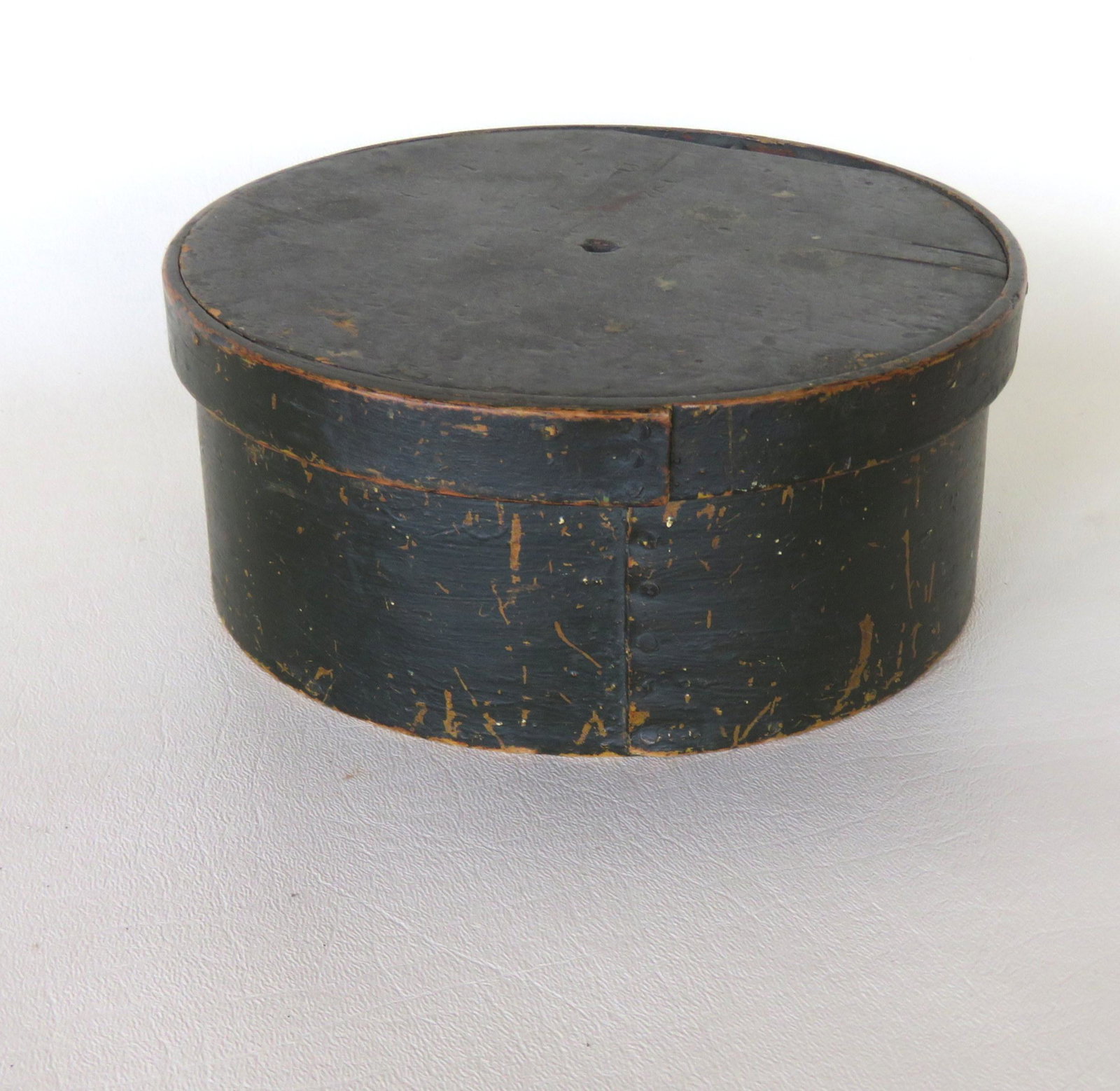 Primitive pantry box in grungy old green paint: Primitive pantry box in grungy old green paint over original mustard paint which mustard color still intact on interior - probably used as a sewing box as has small string hole in center - early to mi