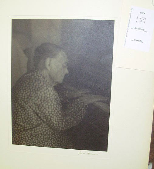 Doris Ulmann Platinum print of an elderly lady: Platinum print of an elderly lady playing a piano - pencil signed "Doris Ulmann" (6" x 8")
