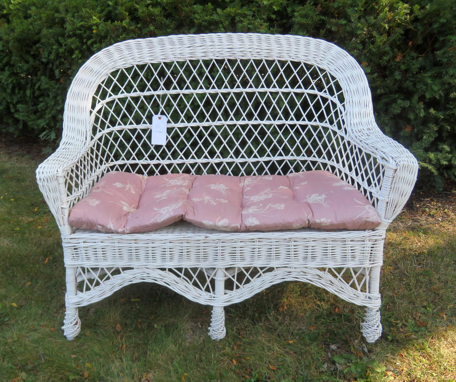 Wicker love seat in white paint, very good condition.: Wicker love seat in white paint, very good condition. 47"W x 40"H x 26"D. Provenance: From the Stanley Blum estate, Rhinebeck NY.