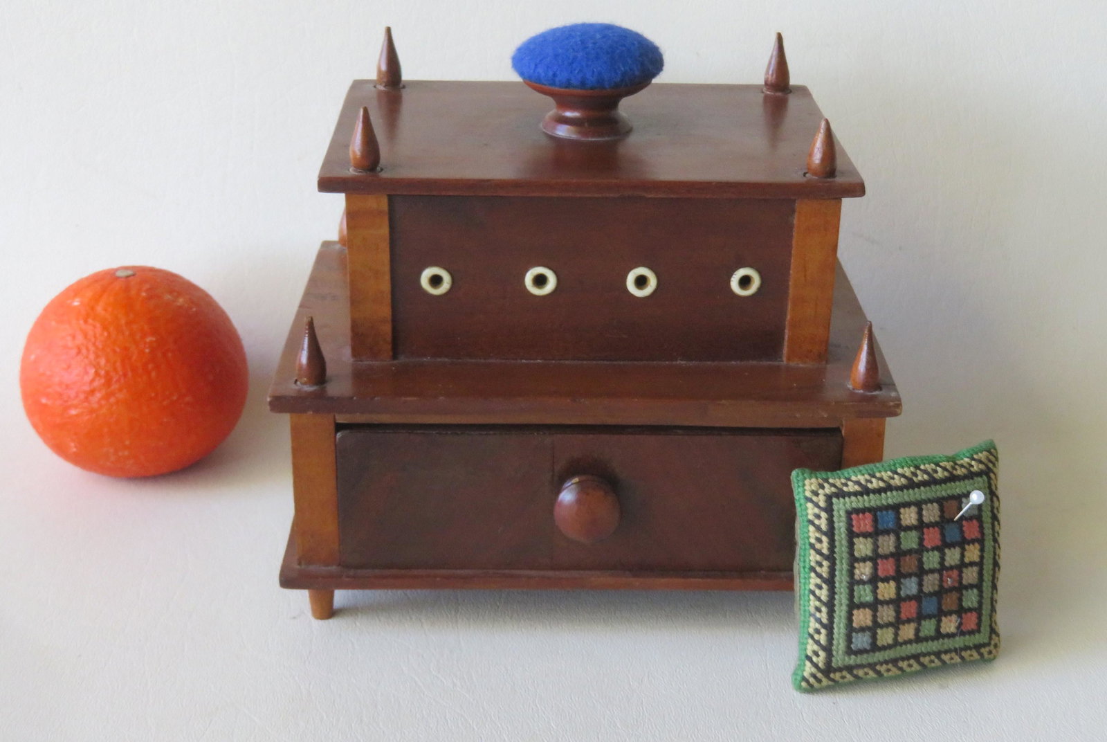 Small Shaker sewing box with lift top with pin cushion: Small Shaker sewing box with lift top with pin cushion and lower drawer - walnut and tiger maple construction - late 19th century - 7"W x 6"H x 5"D. Very good condition.