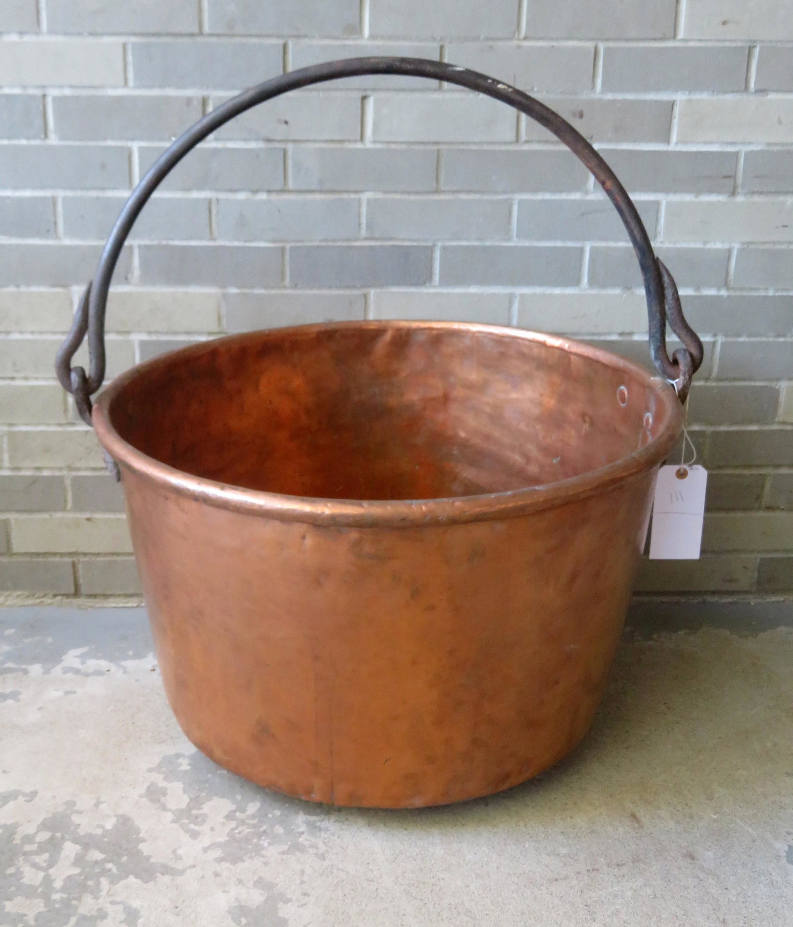 Large copper candy kettle with a hand forged iron: Large copper candy kettle with a hand forged iron handle - 28" dia. X 19"H. Very good condition. 19th century.