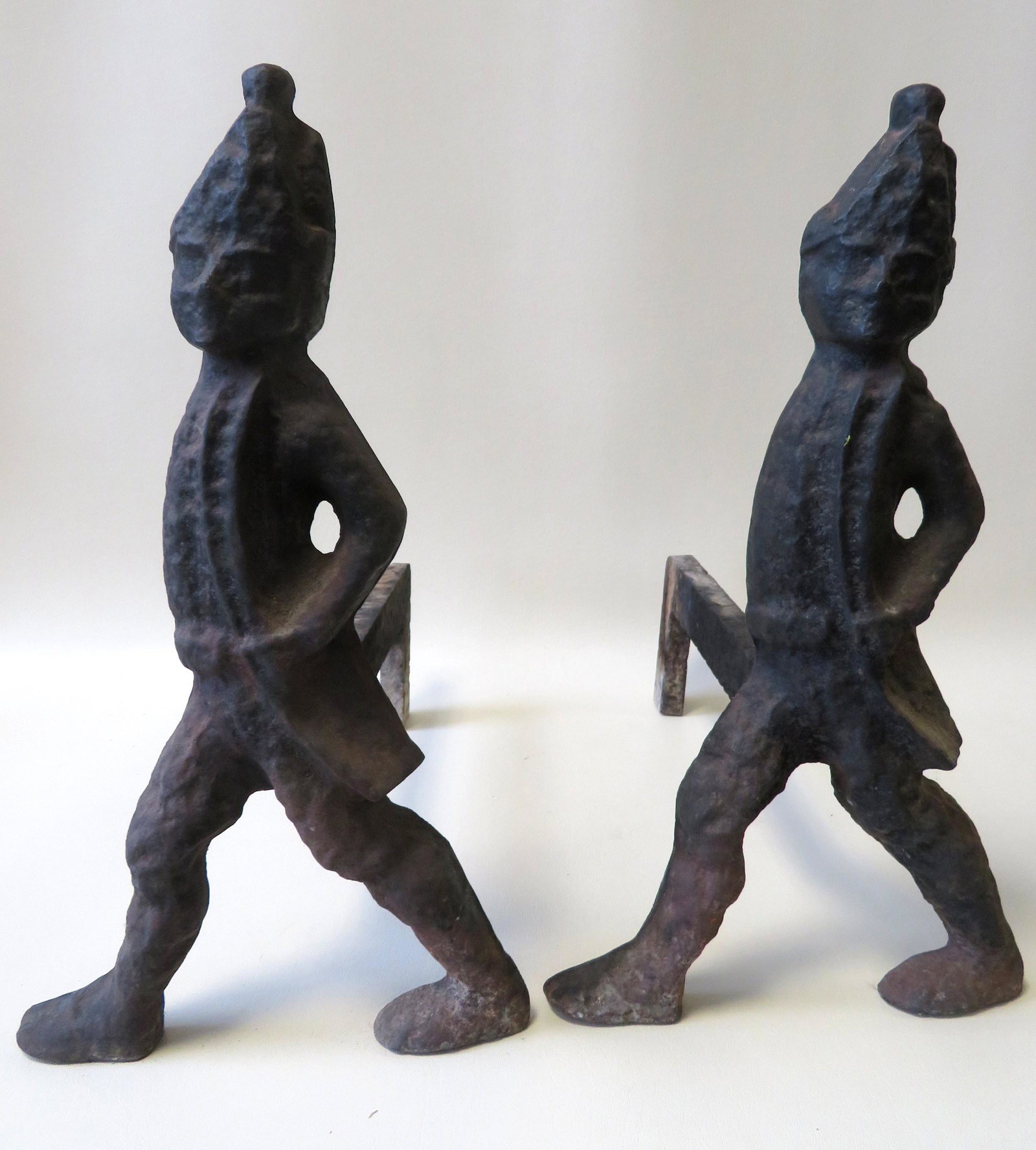 Pair of cast iron Hessian soldier andirons. Very good: Pair of cast iron Hessian soldier andirons. Very good condition. 16 1/2"H x 17"D x 9"W. Late 19th century.