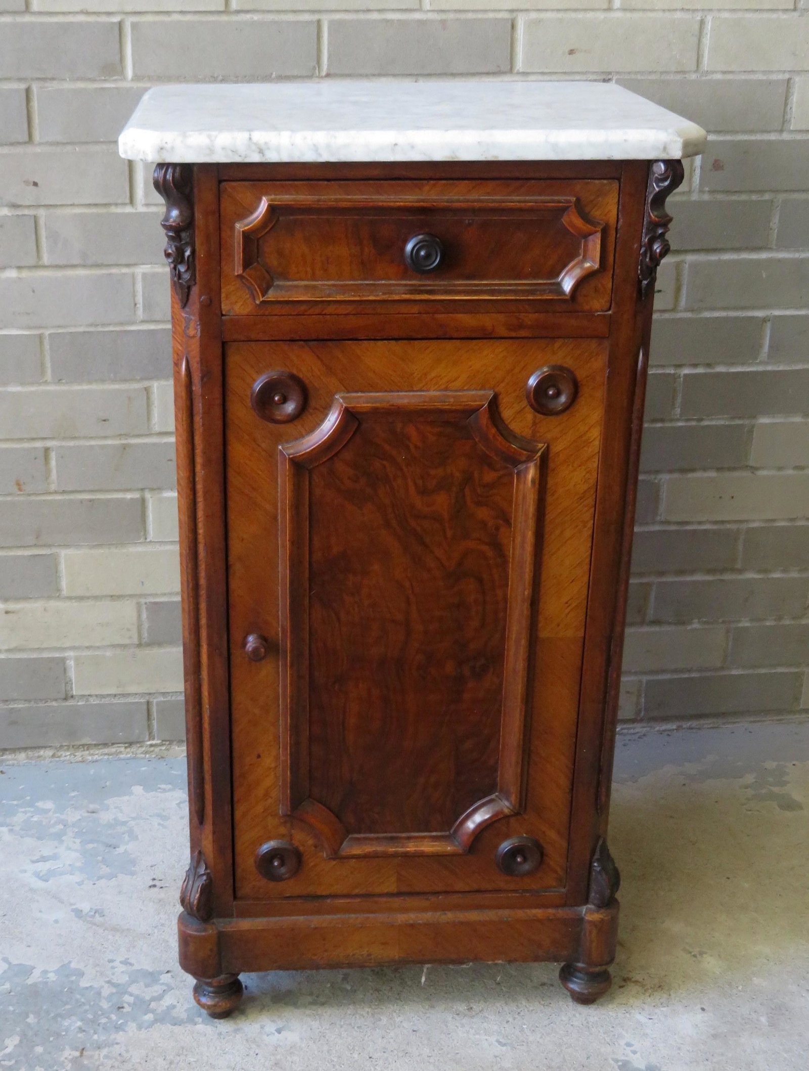 Black walnut Victorian stand with a shaped and beveled: Black walnut Victorian stand with a shaped and beveled marble top over 1 drawer over 1 door - very good condition - 18 1/2"W x 14 1/4"D 33 1/4"H. Circa 1870-80. Provenance: From the Stanley Blum estat