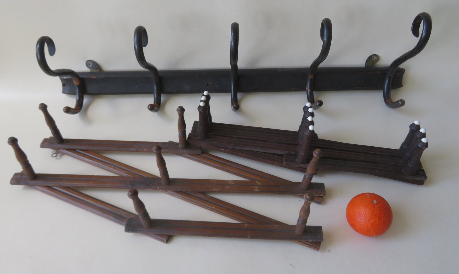 Three wall mounted hat holders, including 2 folding: Three wall mounted hat holders, including 2 folding Victorian style, 19th century. All in good condition. The largest 34"L x 10"H.