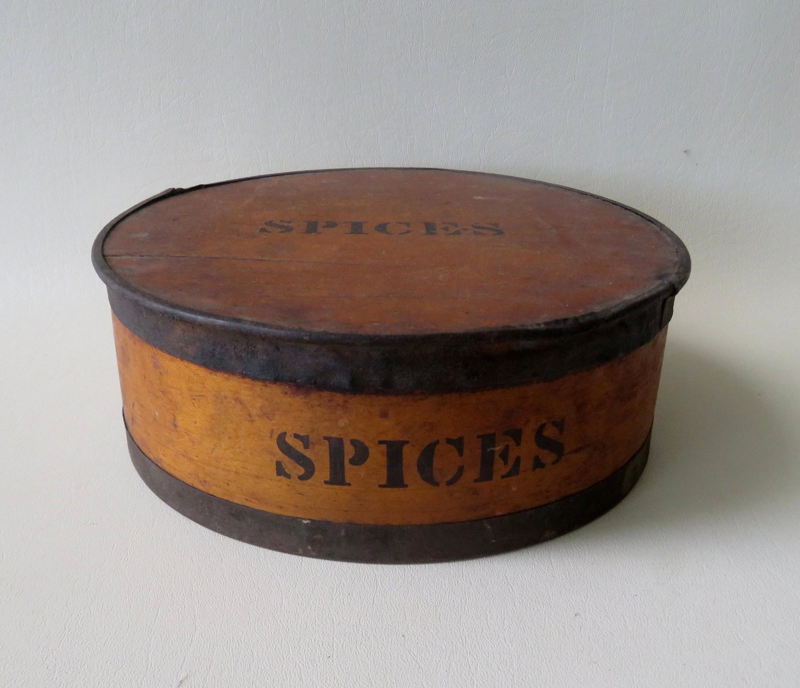 Round birch spice box in original finish and stenciled: Round birch spice box in original finish and stenciled on lid "SPICES" having its original 8 interior boxes all with stenciled names on lid including Cinnamon, Mace, Cloves, etc. - most still containi